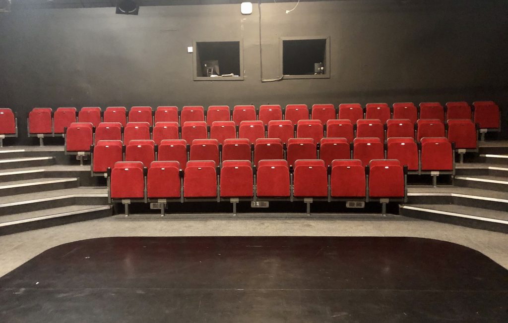 Seats in front of a stage
